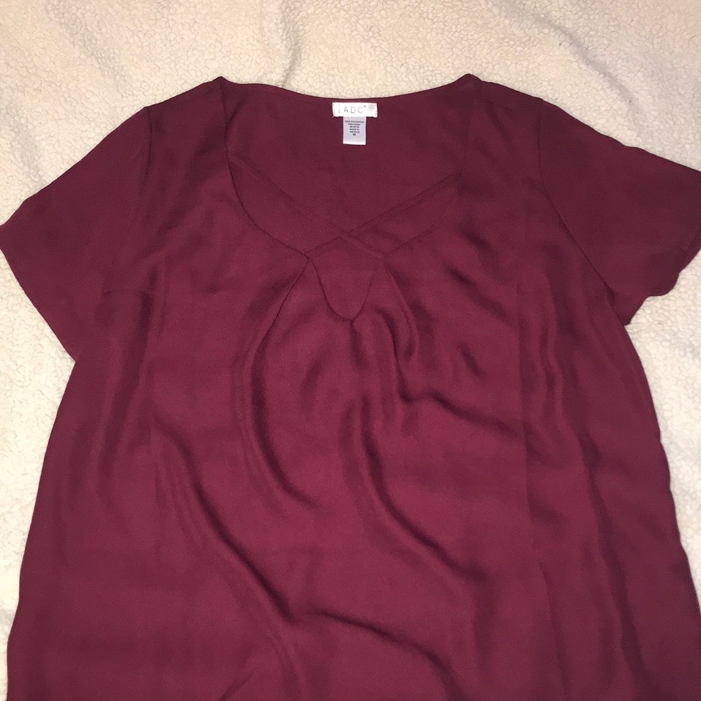 Maroon blouse with criss-cross front